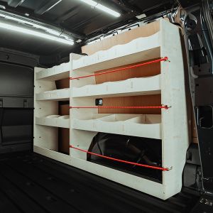 Rear van side angle view of the Ford Transit Connect LWB 2024- Driver-Side Multi-Compartment Van Racking
