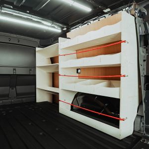 Rear van side angle view of the Transit Connect LWB 2024- Driver-Side Van Racking with x3 Toolbox Shelves
