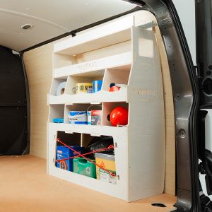 Rear side angle view of the VW Transporter T5/T6 Rear Ulti-Rack Van Racking displaying equipment, tools and boxes