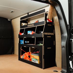 Rear side angle view of the Vauxhall Vivaro B 2014-2019 Hexaboard Rear Ulti-Rack Van Racking displaying equipment, tools and boxes