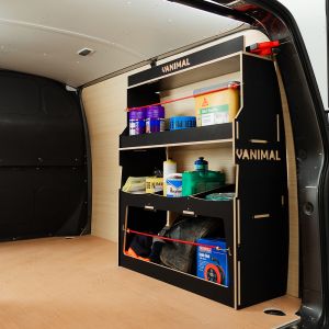 Rear side angle view of the Vauxhall Vivaro B 2014-2019 Hexaboard Rear Ulti-Rack Van Racking V2 displaying equipment, tools and boxes