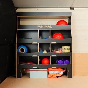 Side van view of the Vauxhall Vivaro C 2019- Hexaboard Front Ulti-Rack Van Racking displaying equipment, tools and boxes