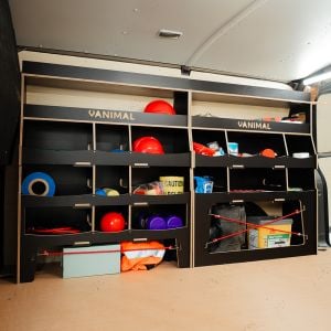 Side van angle view of the Peugeot Expert 2016- Hexaboard Driver Side Ulti-Rack Van Racking displaying equipment, tools and boxes